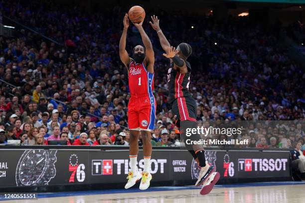 James Harden of the Philadelphia 76ers shoots the ball against Jimmy Butler of the Miami Heat in the first half during Game Four of the 2022 NBA...