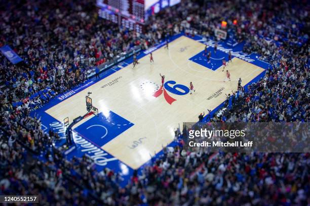 General view of the Wells Fargo Center as James Harden of the Philadelphia 76ers reacts after a made three point basket against the Miami Heat in the...