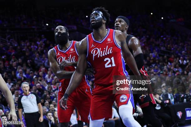 Joel Embiid, James Harden of Philadelphia 76ers and Jimmy Butler of Miami Heat in action during NBA semifinals between Philadelphia 76ers and Miami...