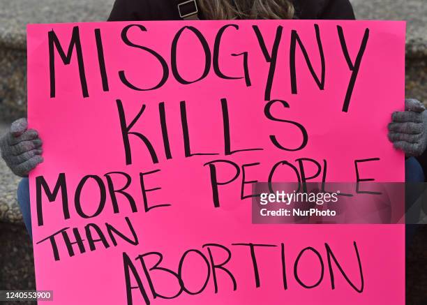 An activist holds a Pro-Choice poster. Local pro-Choice activists gathered at the Alberta Legislature in solidarity with US women to protest in...