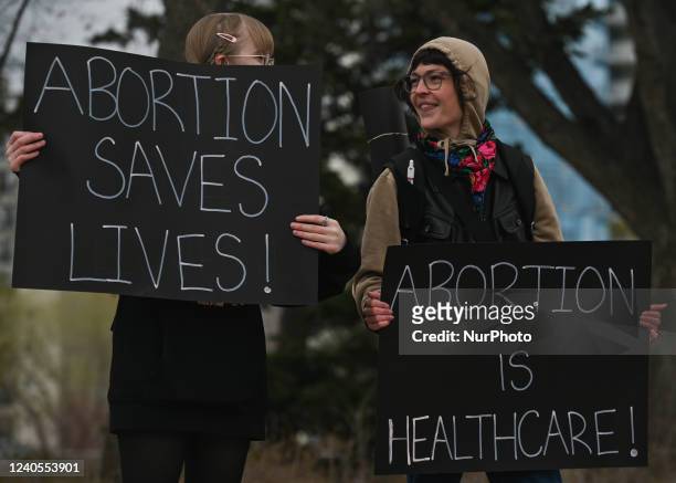 Activists hold Pro-Choice posters. Local pro-Choice activists gathered at the Alberta Legislature in solidarity with US women to protest in defense...
