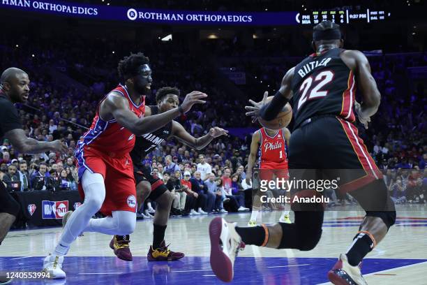 Joel Embiid of Philadelphia 76ers and Jimmy Butler of Miami Heat in action during NBA semifinals between Philadelphia 76ers and Miami Heat at the...