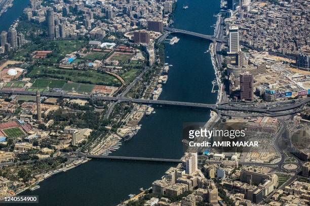 This picture taken on May 6, 2022 shows an aerial view of Cairo's Nile island of Zamalek with the Cairo Tower and the nearby Tahrir Square and Abdel...