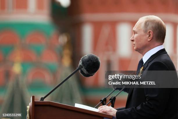 Russian President Vladimir Putin gives a speech during the Victory Day military parade at Red Square in central Moscow on May 9, 2022. Russia...