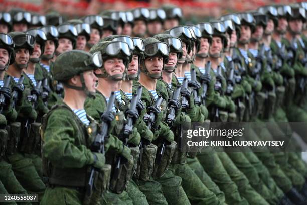 Russian servicemen march on Red Square during the Victory Day military parade in central Moscow on May 9, 2022. - Russia celebrates the 77th...