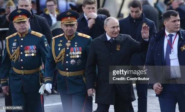 Russian President Vladimir Putin , Defence Minister Sergei Shoigu and Commander-in-chief of Ground Forces Oleg Salukov attend the Victory Day Parade...