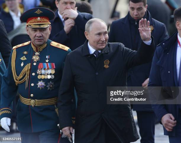 Russian President Vladimir Putin and Defence Minister Sergei Shoigu attend the Victory Day Parade at Red Square on May 9, 2022 in Moscow, Russia....
