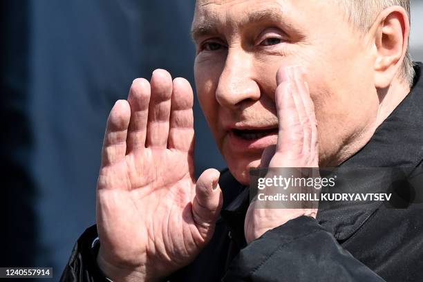 Russian President Vladimir Putin leaves Red Square after the Victory Day military parade in central Moscow on May 9, 2022. - Russia celebrates the...