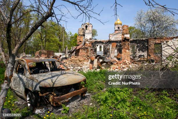 View of residental house and Ascension Church destroyed during the Russian occupation of Lukashivka village, Chernihiv area, May 08, 2022
