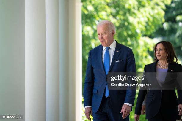 President Joe Biden and Vice President Kamala Harris walk to the Rose Garden for an event on high speed internet access for low-income Americans, at...