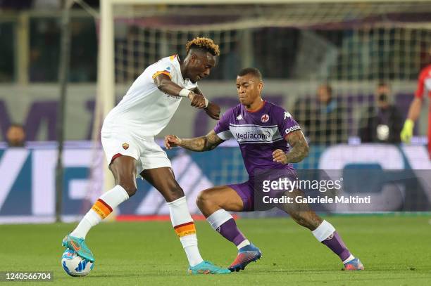 Tammy Abraham of AS Roma battles for the ball with Igor Julio dos Santos de Paulo of ACF Fiorentina during the Serie A match between ACF Fiorentina...