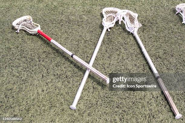 General view of lacrosse sticks on the sideline during halftime of the Ivy League Tournament championship college lacrosse game between the...