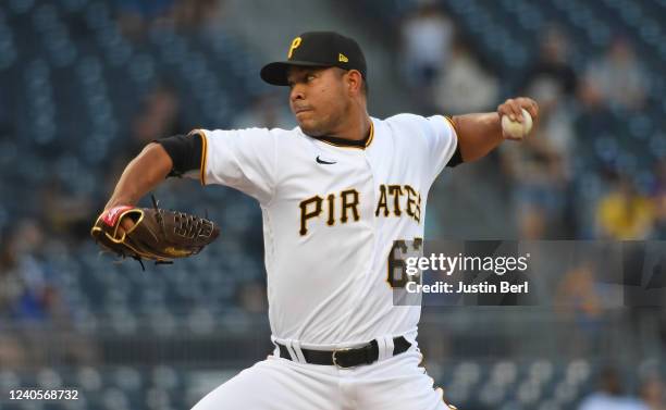 Jose Quintana of the Pittsburgh Pirates delivers a pitch in the second inning against the Los Angeles Dodgers at PNC Park on May 9, 2022 in...