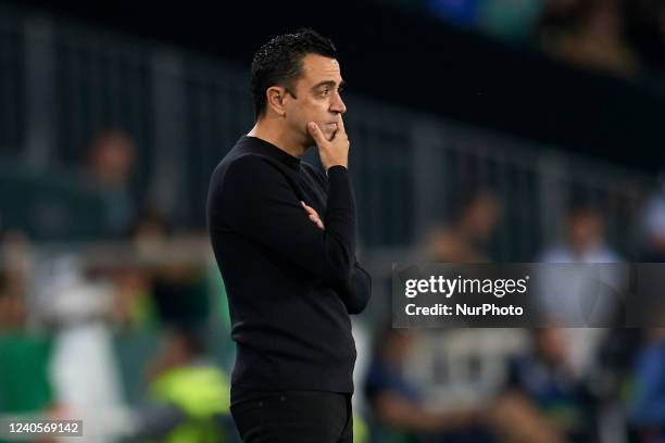 Xavi Hernandez head coach of Barcelona reacts during the La Liga Santander match between Real Betis and FC Barcelona at Estadio Benito Villamarin on...