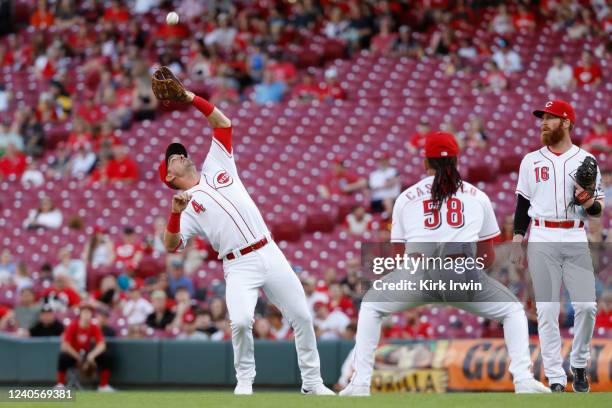 Matt Reynolds of the Cincinnati Reds catches a pop up in the second inning during the game between the Milwaukee Brewers and the Cincinnati Reds at...