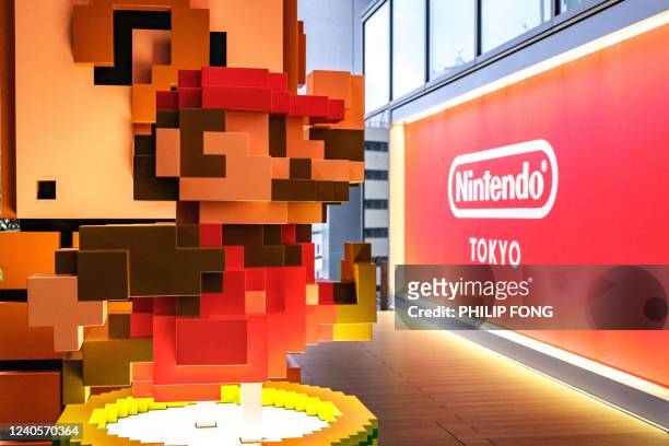 In this picture taken on May 9 a logo of Nintendo is pictured at its store in Tokyo.