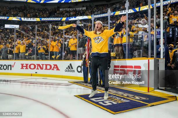 Nashville SC soccer player Walker Zimmerman revs up the crowd prior to Game Four of the First Round of the 2022 Stanley Cup Playoffs between the...