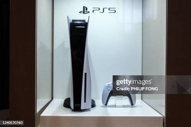 In this picture taken on May 9 a Sony Playstation 5 video game console is displayed at the company's headquarters in Tokyo.