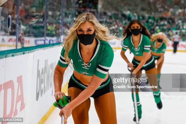 The Dallas Stars Ice Girls clear the ice during game 4 of the first round of the Stanley Cup Playoffs between the Dallas Stars and the Calgary Flames...