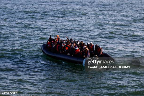 Migrants call the Abeille Languedoc for help following a failed crossing attempt due to a problem in the boats engine in French waters while trying...