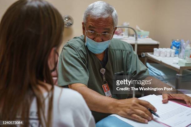 Dr. Franz Theard consults a woman seeking abortion from Oklahoma in his clinic, Womens Reproductive Clinic, a provider of abortions in Santa Teresa,...