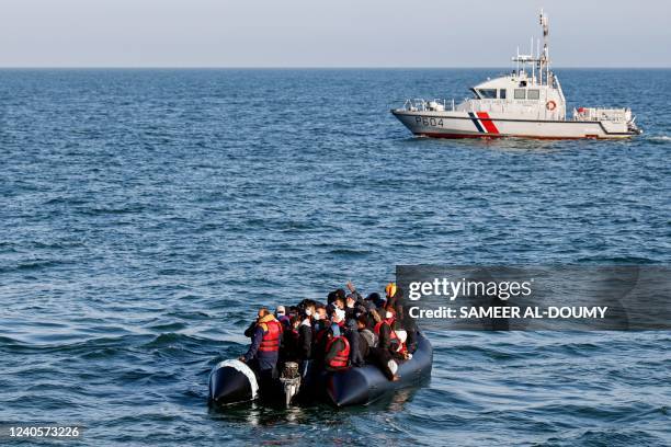 Migrants call the Abeille Languedoc for help after their boat's generator broke down in French waters while they were trying to cross the Channel...