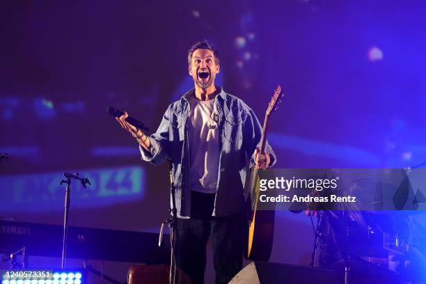 German singer and actor Tom Beck performs on stage at drive-in Autokino Dusseldorf during the Coronavirus crisis on June 01, 2020 in Dusseldorf,...