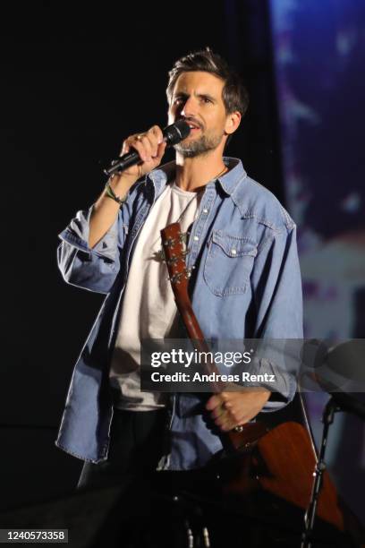German singer and actor Tom Beck performs on stage at drive-in Autokino Dusseldorf during the Coronavirus crisis on June 01, 2020 in Dusseldorf,...