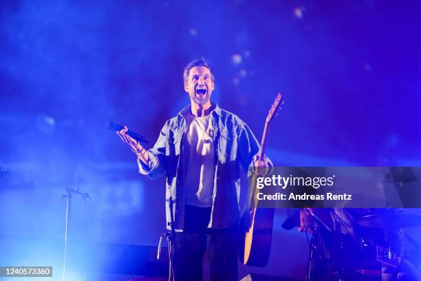 German singer and actor Tom Beck performs on stage at drive-in Autokino Dusseldorf during the Coronavirus crisis on June 01, 2020 in Dusseldorf,...