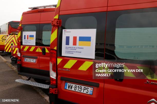 Vehicles that will be part of a delivery of emergency equipment and vehicles to Ukraines Emergency Situations Service are seen in Villabe, outside...