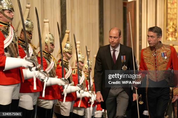 Prince William, Duke of Cambridge walks through the Norman Porch for the State Opening of Parliament in the House of Lords at the Palace of...