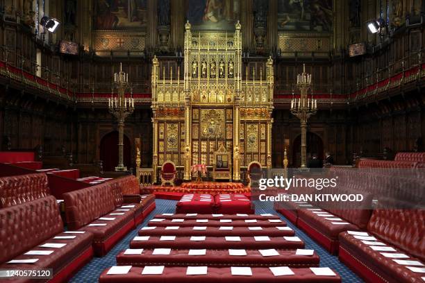 Photograph taken on May 10, 2022 showas a general view of the House of Lords chamber with the Sovereign's Throne set aside ahead of the state opening...