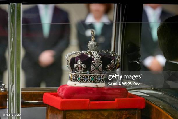 Car carrying the crown arrives for the State Opening of Parliament in the House of Lords at the Palace of Westminster on May 10, 2022 in London,...