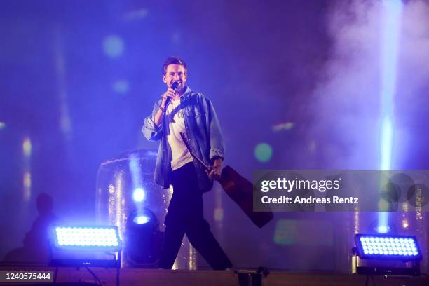 German singer and actor Tom Beck performs on stage at drive-in Autokino Dusseldorf during the Coronavirus crisis on June 01, 2020 in Dusseldorf,...