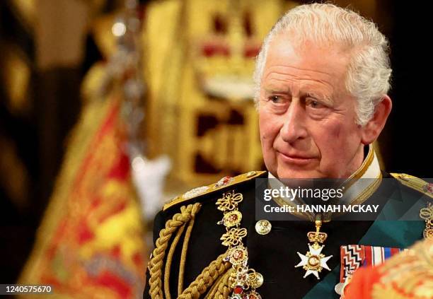 Britain's Prince Charles, Prince of Wales proceeds through the Royal Gallery during the State Opening of Parliament at the Houses of Parliament, in...