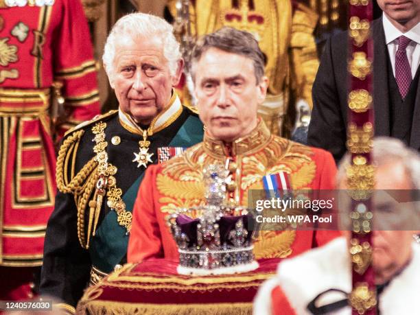 Prince Charles, Prince of Wales processes along the Royal gallery with Camilla, Duchess of Cornwall and Prince William, Duke of Cambridge during the...