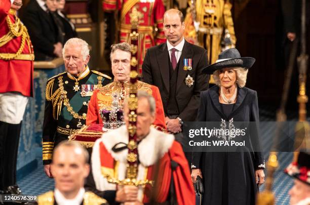 Prince Charles, Prince of Wales processes along the Royal gallery with Camilla, Duchess of Cornwall and Prince William, Duke of Cambridge during the...