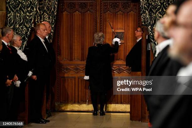 Sarah Clarke, Black Rod, bangs on the doors to the house of commons at the beginning of the State Opening ceremony of Parliament at the Palace of...