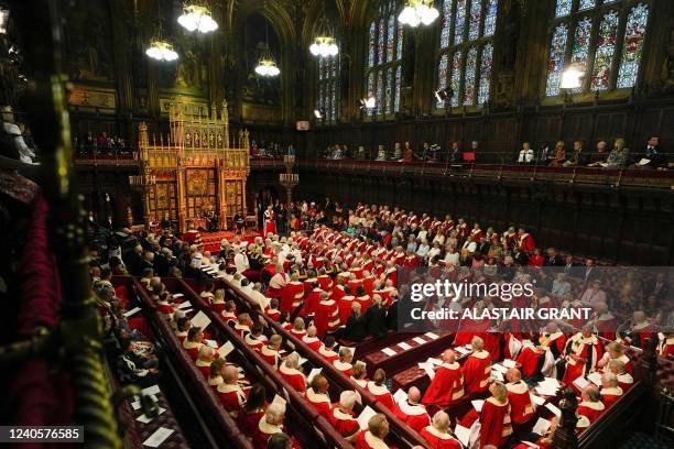 Britain's Prince Charles, Prince of Wales delivers the Queen's Speech in the House of Lords Chamber during the State Opening of Parliament at the...