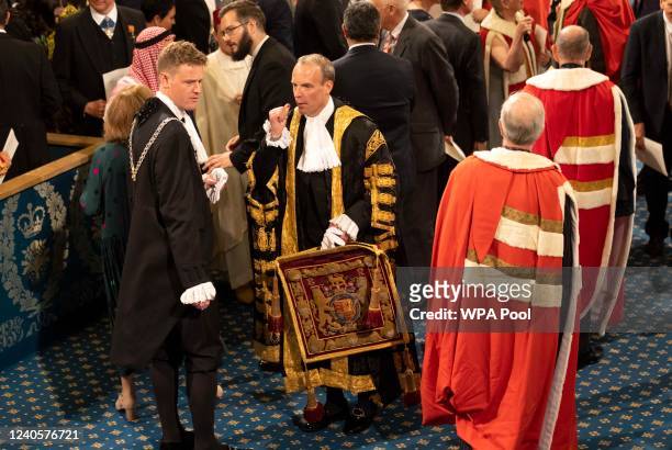 Deputy Prime Minister and Justice secretary Dominic Raab in full ceremonial robes as he talks with guests following the state opening of Parliament...