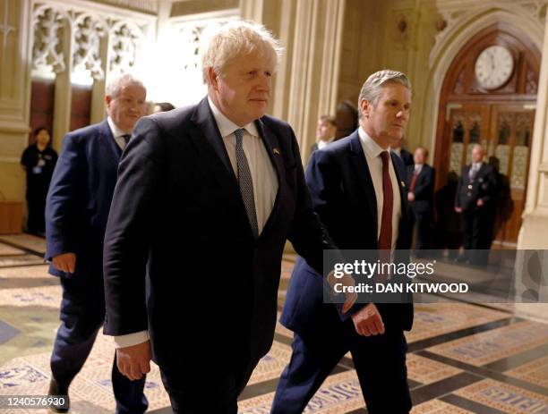 Britain's Prime Minister Boris Johnson and Britain's main opposition Labour Party leader Keir Starmer attend the State Opening of Parliament at the...