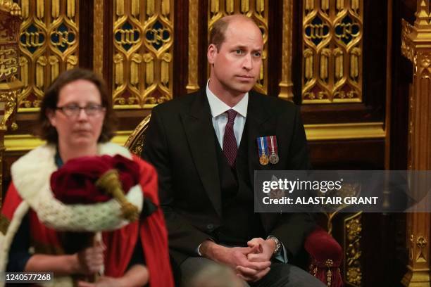 Britain's Prince William, Duke of Cambridge, listens to the Queen's Speech, in the House of Lords chamber, during the State Opening of Parliament, at...