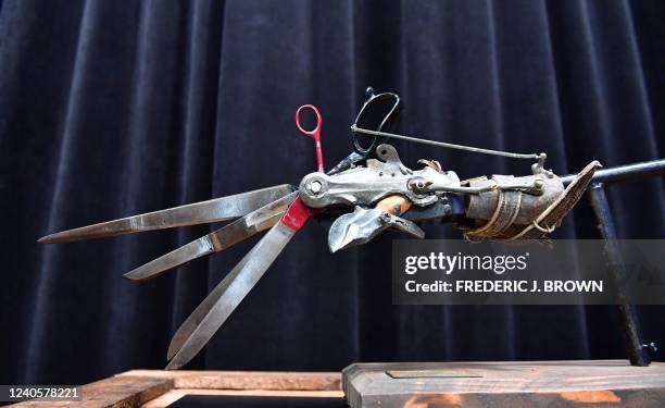 The insert hand used by US actor Johnny Depp in the 1990 film "Edward Scissorhands" is displayed at Propstore on May 9, 2022 in Valencia, California...