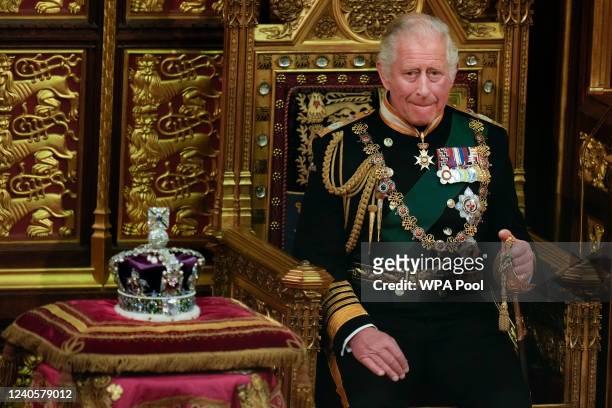 Prince Charles, Prince of Wales seated next to the Queen's Imperial State Crown in the House of Lords Chamber, during the State Opening of Parliament...