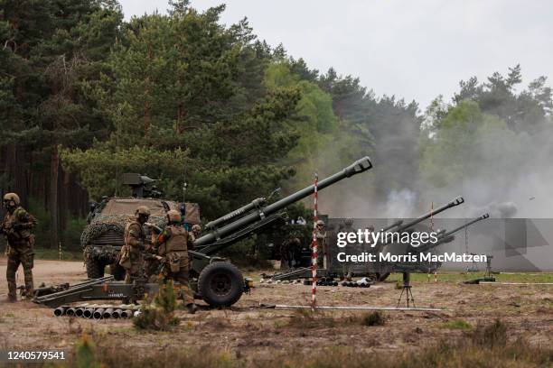 Soldiers of the Belgian armed forces, participate with the Lightgun 1 105mm howitzer in the Wettiner Heide international joint military exercises of...