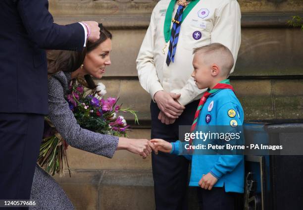 The Duke and Duchess of Cambridge speak to Archie McWilliams, aged 7, from the First Longford Scout Group in Stretford, and his uncle Greater...