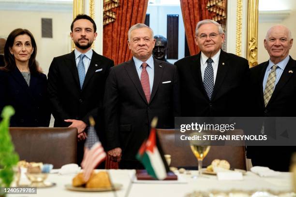 King Abdullah II of Jordan stands for a photo with US Senator Bob Menendez , Chairman of the Senate Foreign Relations Committee, and US Senator Ben...