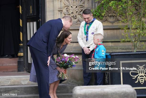 The Duke and Duchess of Cambridge speak to Archie McWilliams, aged 7, from the First Longford Scout Group in Stretford, and his uncle Greater...