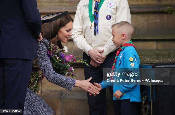 The Duke and Duchess of Cambridge speak to Archie McWilliams, aged 7, from the First Longford Scout Group in Stretford, and his uncle Greater...