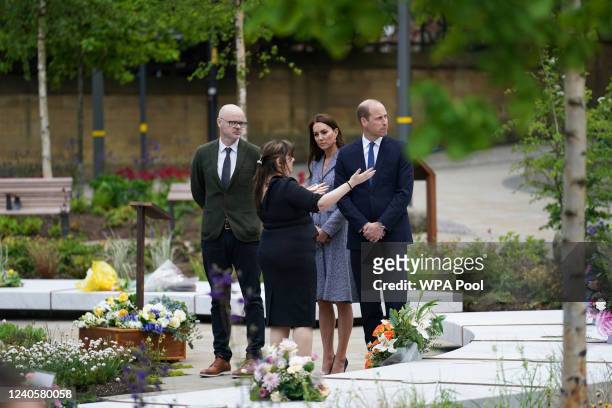 The memorial designer Andy Thomson, left, the director of BCA Landscape and Joanne Roney, 2nd left, the chief executive of Manchester City Council...
